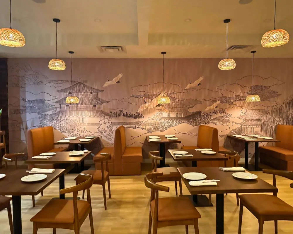 Spacious dining hall with Asian landscape murals at SOHO Asian Fusion, a Asian Fusion Restaurant in Austin.