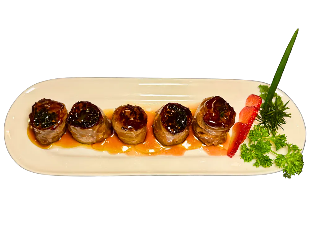 Ribeye and scallion rolls with teriyaki sauce at SOHO Asian Fusion, a Asian Fusion Restaurant in Austin.
