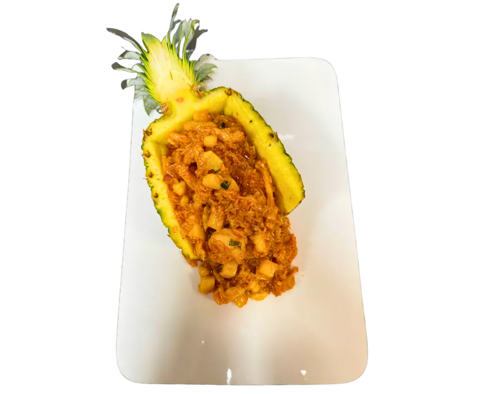 Fried rice with shrimp & chicken served in a pineapple at SOHO Asian Fusion, a Asian Fusion Restaurant in Austin.