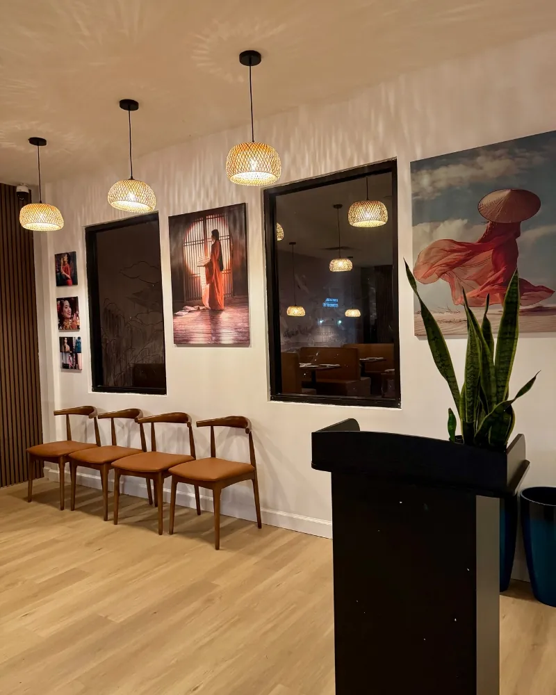 Welcoming waiting area with modern seating and art at SOHO Asian Fusion, a Asian Fusion Restaurant in Austin.
